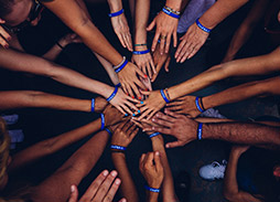 image of people joining their hands