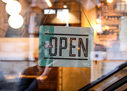 image of shop door with open sign